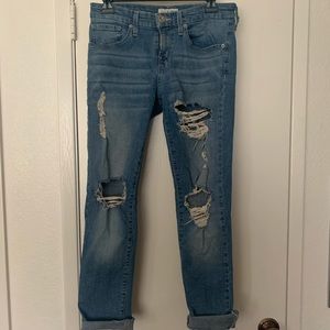 Distressed blue jeans
